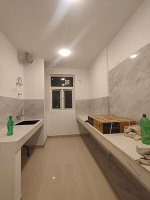 Kitchen in 2 BHK Apartment at Omaxe Hazratganj Residency, Gomti Nagar – for Sale