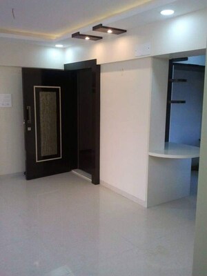 Living Room in 1 BHK Apartment at Tricity Luxuria, New Panvel – for Sale