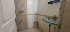 Bathroom in 2 BHK Apartment at Dedhia Palatial Height, Powai – for Rent