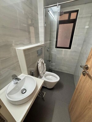 Bathroom in 2 BHK Apartment at Raghav Paradise, Borivali East – for Rent