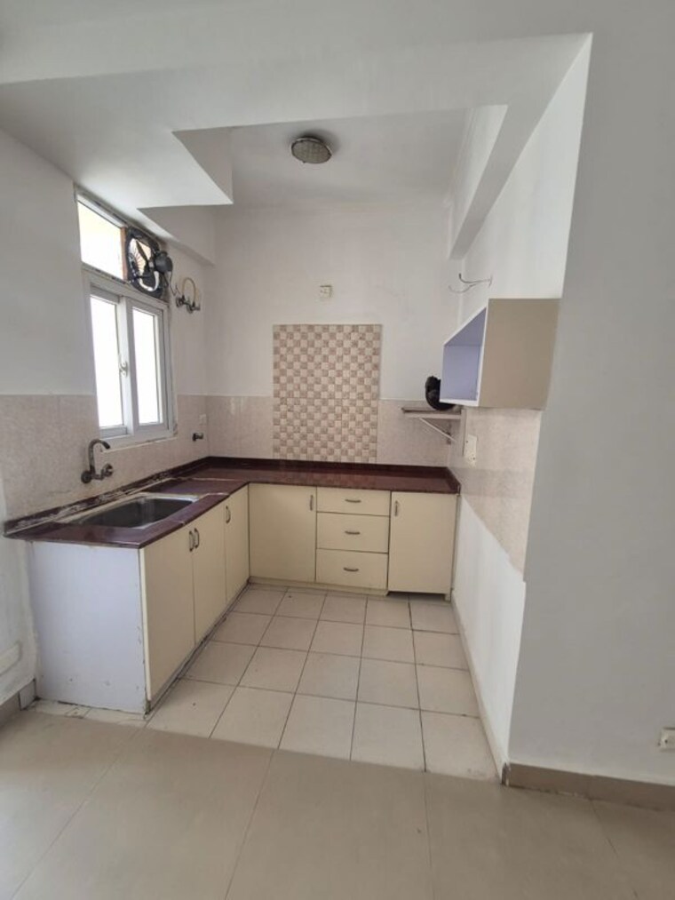 Kitchen, amrapali-princely-estate 2 Bedroom 875 Sq.Ft. Apartment In Sector 76 Noida 10169567