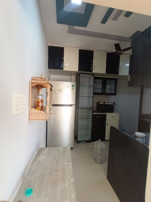 Kitchen in 2 BHK Apartment at Raj Heramba Venkatesh Imperia, Tathawade – for Rent