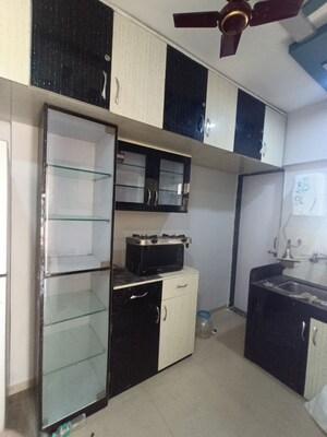 Kitchen in 2 BHK Apartment at Raj Heramba Venkatesh Imperia, Tathawade – for Rent