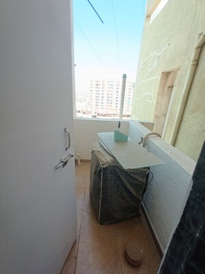Bathroom in 2 BHK Apartment at Raj Heramba Venkatesh Imperia, Tathawade – for Rent