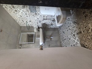 Bathroom in 3 BHK Apartment at Royal Palms Garden View, Goregaon East – for Rent