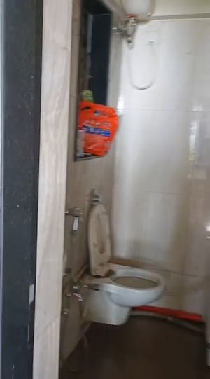 Bathroom in 2 BHK Apartment at Vile Parle East – for Sale