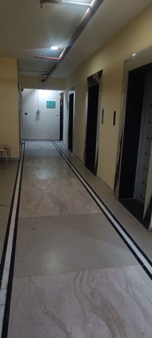 Building Lobby in 3 BHK Apartment at Gururprasad CHS, Chembur – for Rent