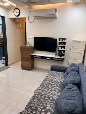 Living Room in 2 BHK Apartment at Runwal Eirene, Balkum Pada – for Rent