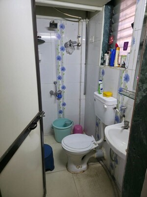 Bathroom in 2 BHK Apartment at Runwal Eirene, Balkum Pada – for Rent
