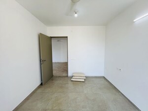 Room in 2 BHK Apartment at Hiranandani Woodpark Apartment, Ghodbunder Road – for Sale