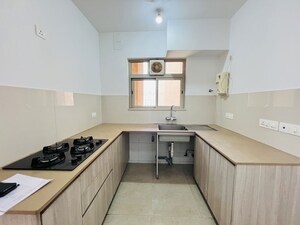 Kitchen in 2 BHK Apartment at Hiranandani Woodpark Apartment, Ghodbunder Road – for Sale