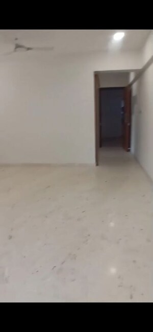 Room in 2.5 BHK Apartment at Ekta Tripolis, Goregaon West – for Sale