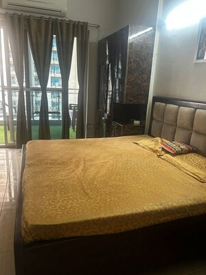 Bedroom in 3.5 BHK Apartment at Gaur Sportswood, Sector 79 – for Rent