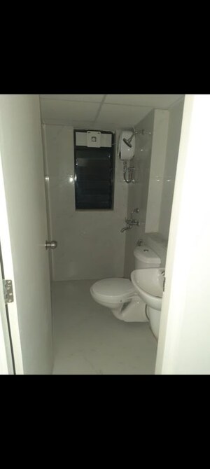 Bathroom in 2 BHK Apartment at Runwal Gardens, Dombivli East – for Rent