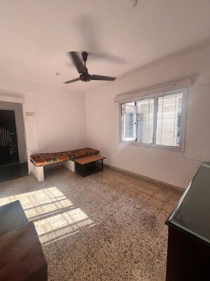 Living Room in 1 BHK Apartment at Lokhandwala Complex – for Rent