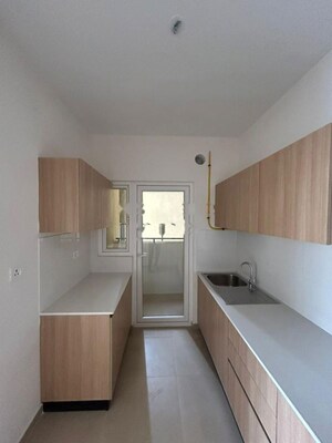 Kitchen in 2 BHK Apartment at Bhartiya Nikoo Homes, Thanisandra Main Road – for Rent