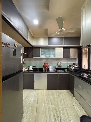 Kitchen in 3 BHK Apartment at Green Valley CHS, Wanwadi – for Sale