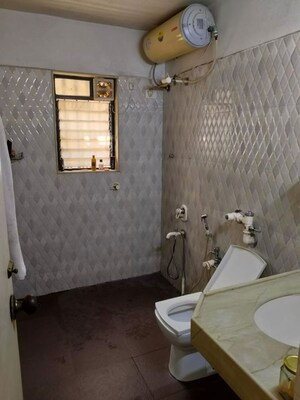 Bathroom in 3 BHK Apartment at Green Valley CHS, Wanwadi – for Sale
