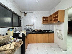 Kitchen in 3 BHK Apartment at Sunshree C2, Nibm – for Sale