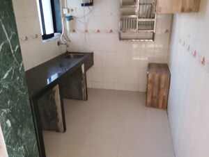 Kitchen in 2 BHK Apartment at Sainath Galaxy Apartment, Ghansoli – for Rent