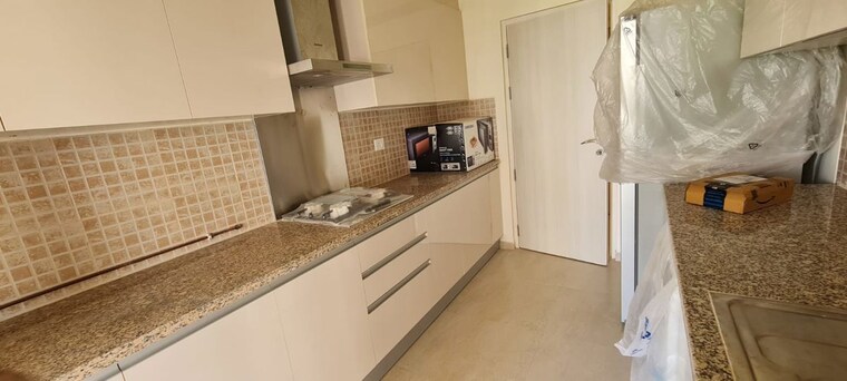 Kitchen, dlf-the-skycourt 3 Bedroom 1931 Sq.Ft. Apartment In Sector 86 Gurgaon 10171240