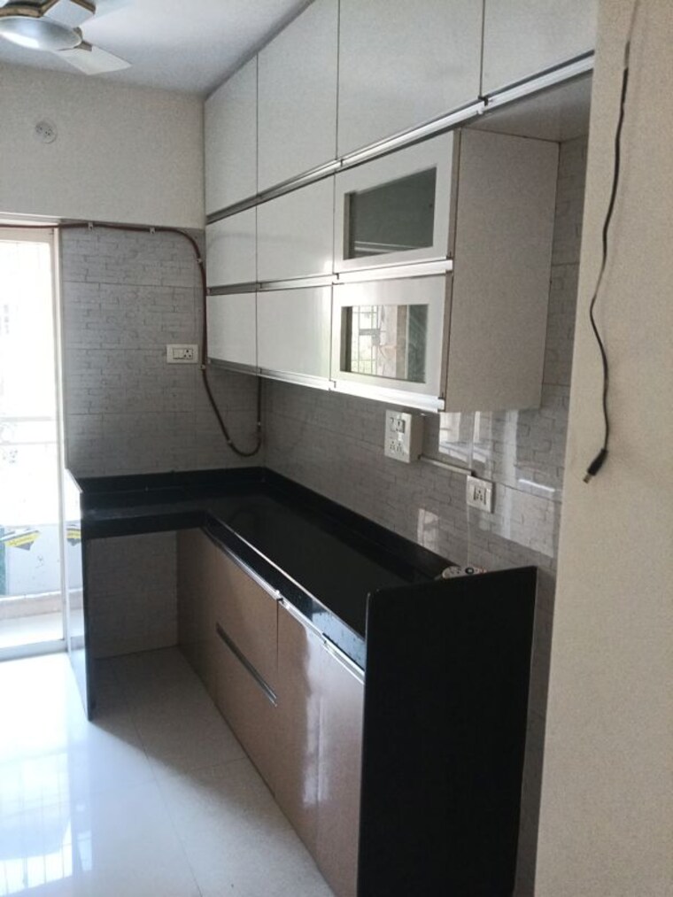 Kitchen, rosa-oasis 2.5 Bedroom 850 Sq.Ft. Apartment In Thane West Thane 10171256