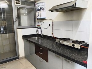 Kitchen in 2 BHK Apartment at Kumar Periwinkle, Kharadi – for Rent