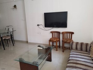 Living Room in 2 BHK Apartment at Kumar Periwinkle, Kharadi – for Rent