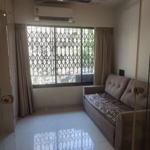 Living Room in 1.5 BHK Apartment at Jal Padma CHS, Goregaon West – for Rent