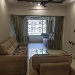 Living Room in 1.5 BHK Apartment at Jal Padma CHS, Goregaon West – for Rent