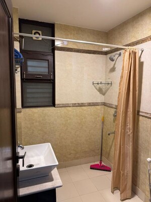 Bathroom in 3 BHK Builder Floor at Green Park Extension – for Rent