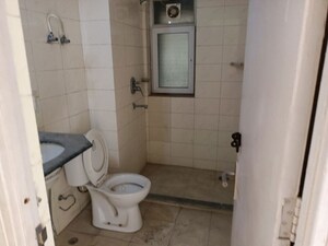 Bathroom in 3 BHK Apartment at Adore Happy Homes Exclusive, Sector 86 – for Sale