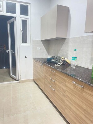 Kitchen in 2 BHK Apartment at Godrej Palm Retreat, Sector 150 – for Sale