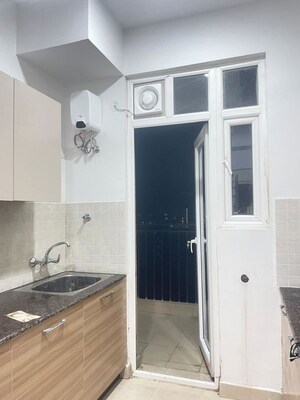 Kitchen in 2 BHK Apartment at Godrej Palm Retreat, Sector 150 – for Sale