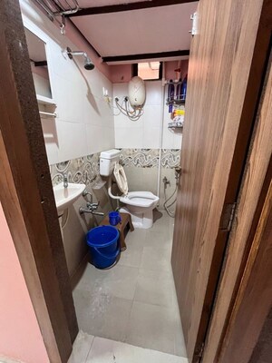 Bathroom in 3 BHK Apartment at Akshar 42, New Ranip – for Sale