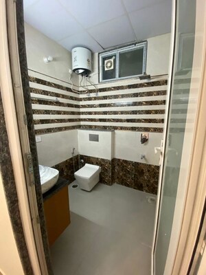Bathroom in 2 BHK Builder Floor at Malibu Shopping Arcade, Sector 47 – for Rent