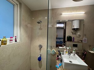 Bathroom in 3 BHK Builder Floor at Ansal API Esencia, Sector 67 – for Rent