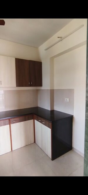 Kitchen in 2 BHK Apartment at Hiranandani Meadows, Manpada – for Rent
