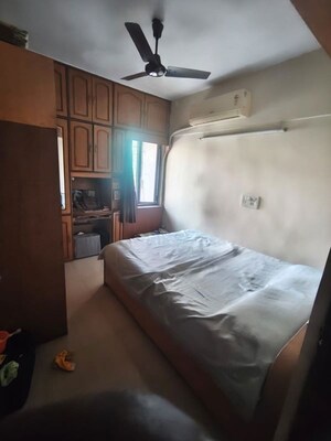 Bedroom in 2 BHK Apartment at Ganga Panchavati CHS, Vasant Vihar – for Rent