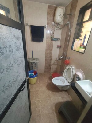 Bathroom in 2 BHK Apartment at Ganga Panchavati CHS, Vasant Vihar – for Rent