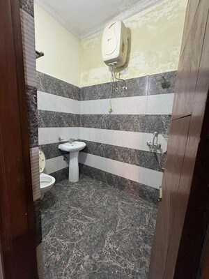 Bathroom in 3 BHK Apartment at Dhakoli – for Sale
