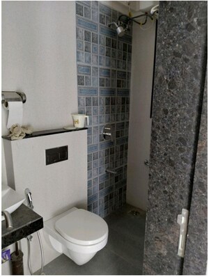 Bathroom in 2 BHK Apartment at Sheth Zuri, Laxmi Nagar – for Rent