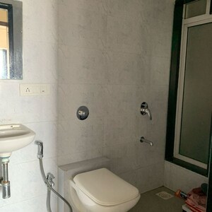 Bathroom in 2 BHK Apartment at Paradigm Ananda Residency, Babhai Naka – for Rent
