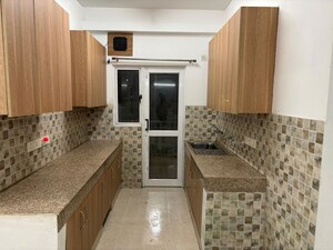 Kitchen in 3.5 BHK Apartment at Pareena Express Heights, Sector 99 – for Rent
