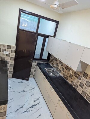 Kitchen in 3 BHK Builder Floor at Sushant Lok Iii – for Sale