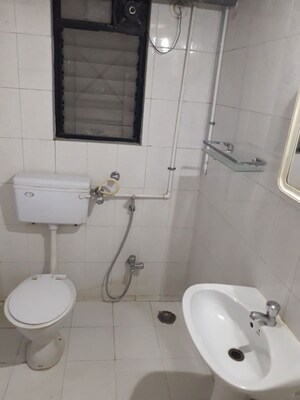 Bathroom in 3 BHK Apartment at Associated Sai Smruti, Dahanukar Colony – for Rent