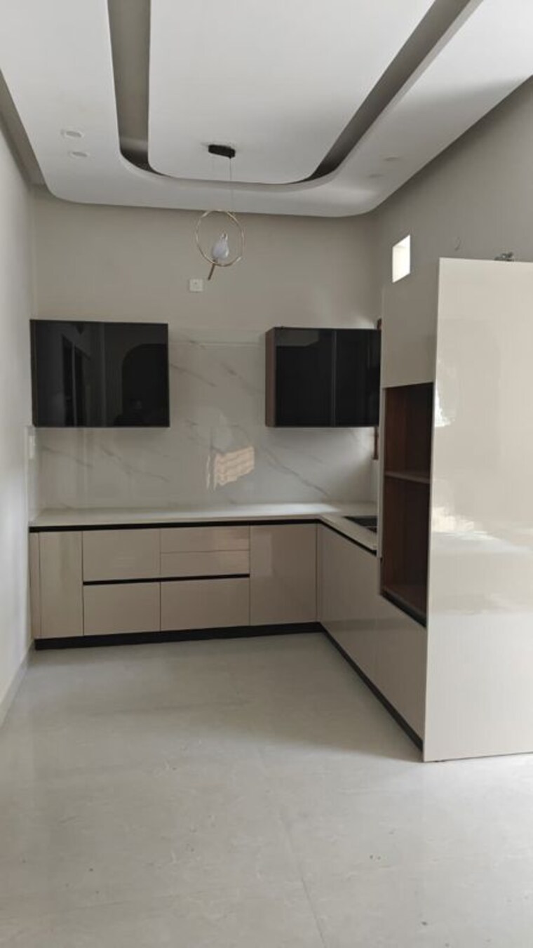 Kitchen, uninav-heights-phase-i 3 Bedroom 1300 Sq.Ft. Apartment In Raj Nagar Extension Ghaziabad 10173331