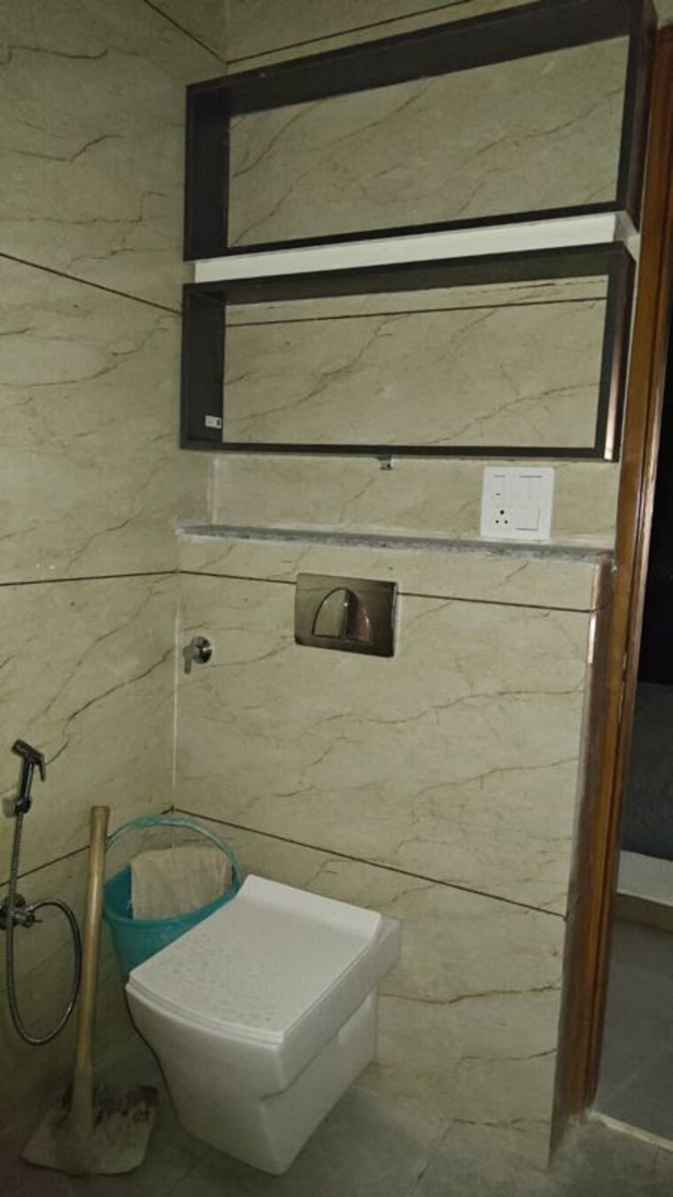 Bathroom, uninav-heights-phase-i 3 Bedroom 1300 Sq.Ft. Apartment In Raj Nagar Extension Ghaziabad 10173331