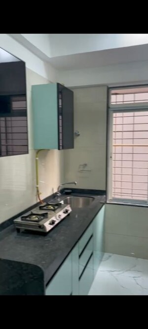 Kitchen in 2 BHK Apartment at Tattva Mittal Cove, Andheri West – for Rent
