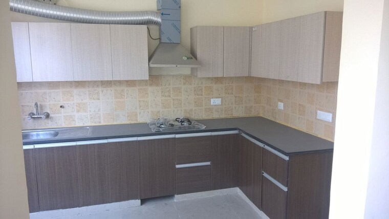 Kitchen, omaxe-spa-village 4 Bedroom 3500 Sq.Ft. Apartment In Sector 78 Faridabad 10173335